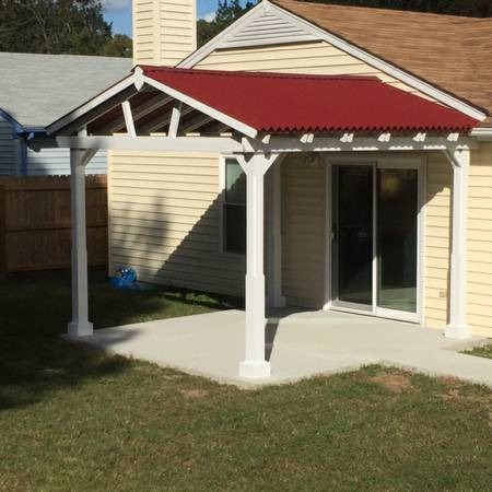 Original job-site photo of the finished patio cover